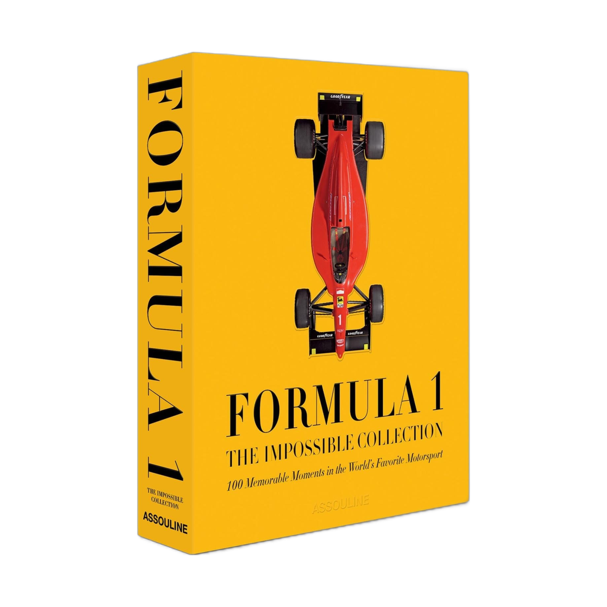 Libro de lujo Formula 1 The Impossible Collection de Assouline, 2ª edición, cubierta amarilla con auto F1 rojo.