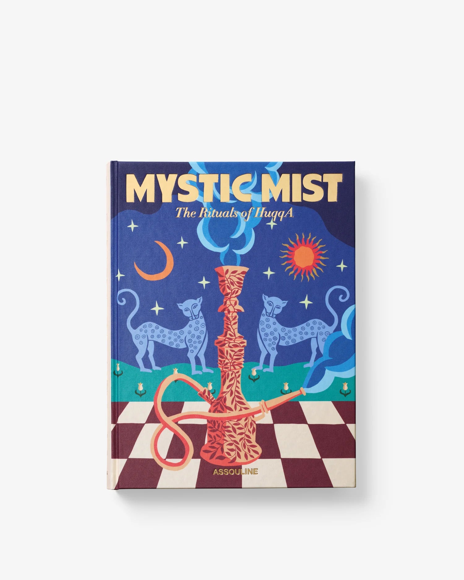 Libro de mesa Mystic Mist The Rituals of HuqqA de Assouline, abierto mostrando su portada ilustrada con motivos de narguila, luna y sol.