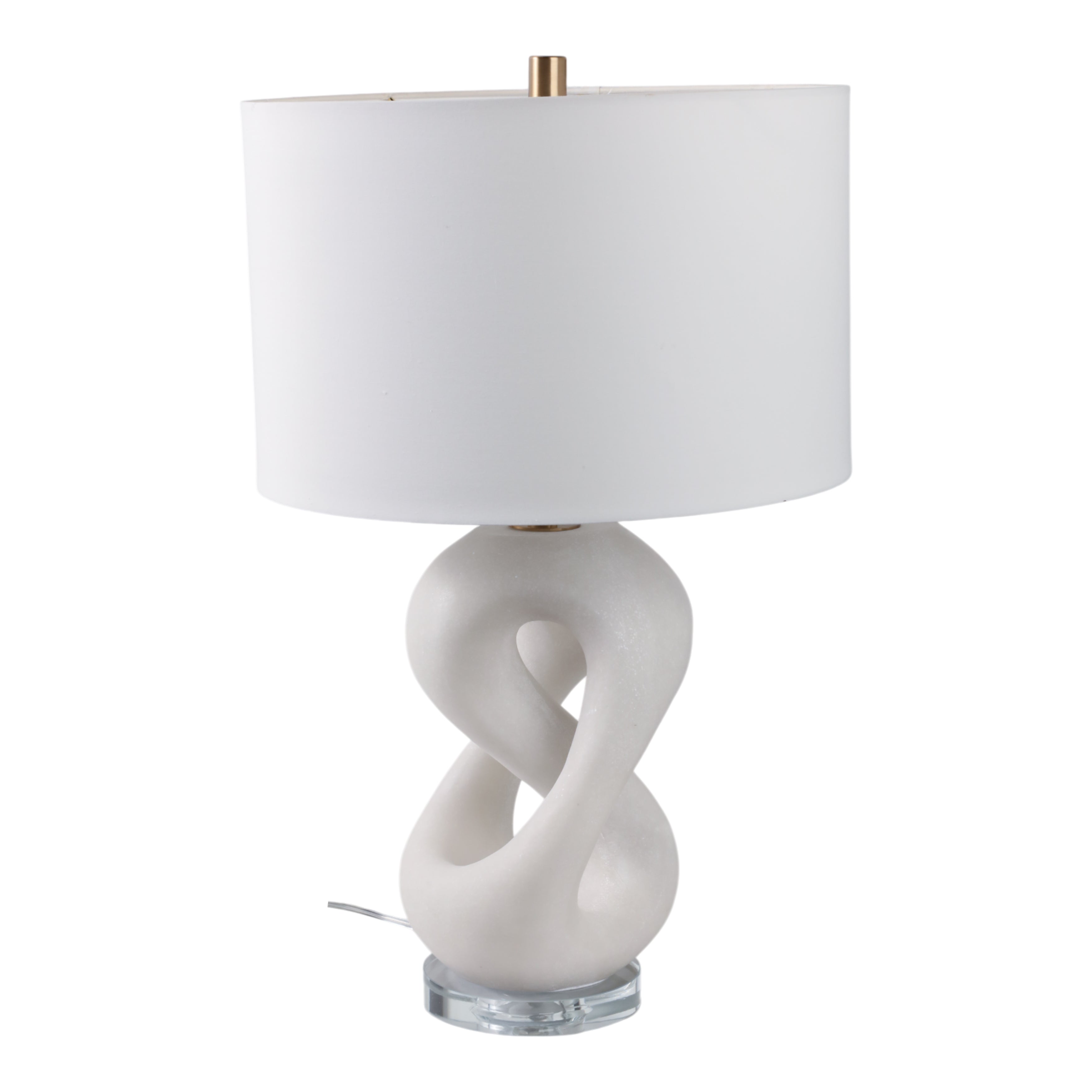 Lámpara de mesa blanca con base escultural abstracta entrelazada y pantalla de tambor blanca.