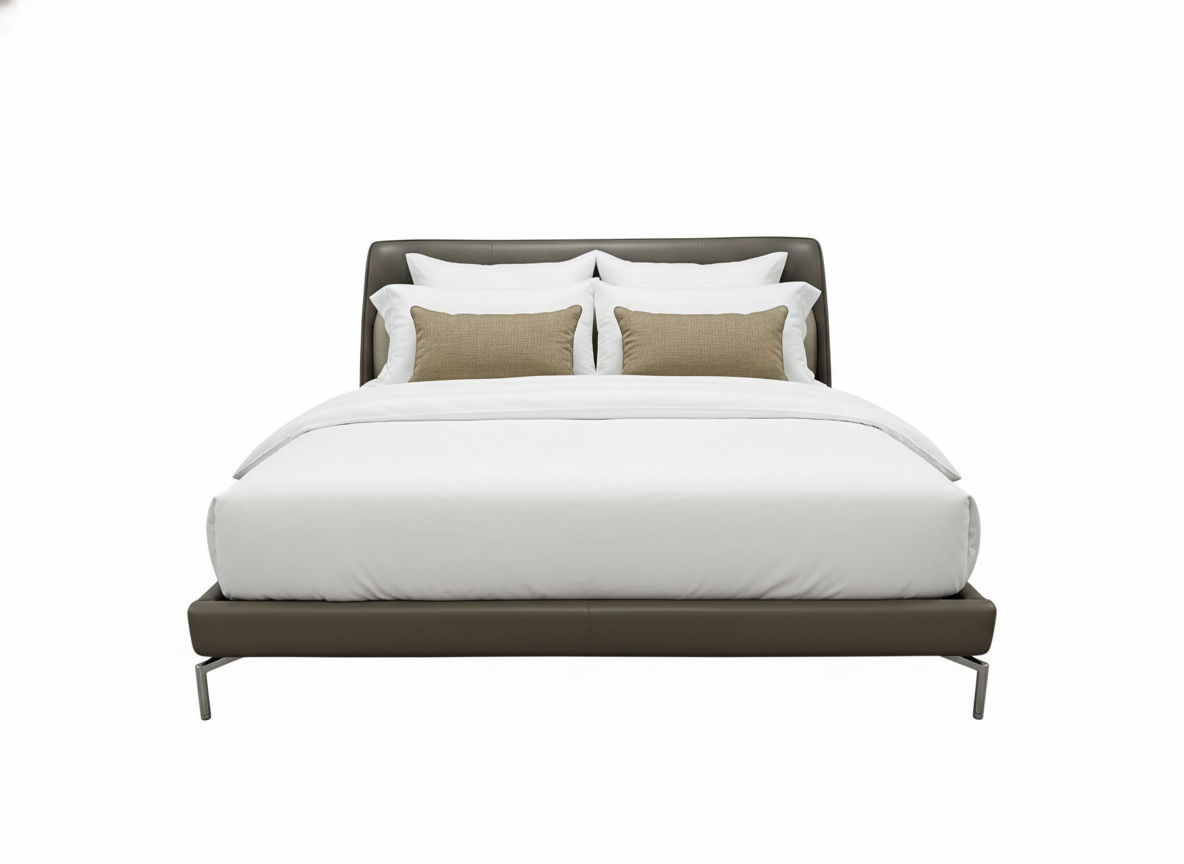 Cama moderna tapizada con cabecero, vestida con sábanas blancas y almohadas