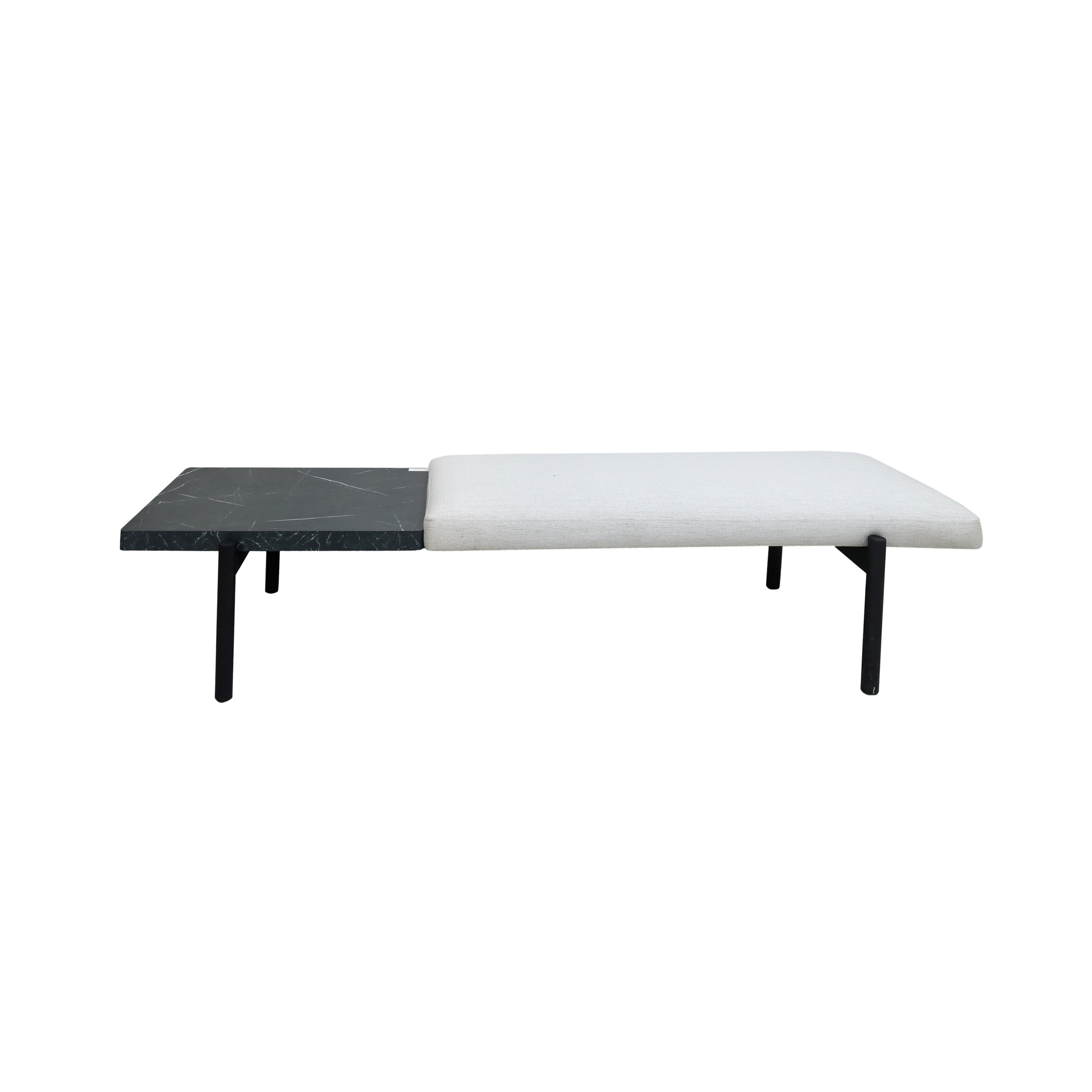 Banca moderna Frida con superficie de mármol negro y asiento tapizado blanco sobre patas metálicas.