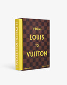 Libro decorativo Assouline From Louis to Vuitton, vista lateral y frontal. Colección de lujo.