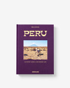 Libro de lujo Assouline Perú. Detalle de la cubierta morada con texto dorado y paisaje andino.
