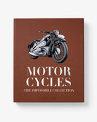 Libro de lujo Assouline Motorcycles The Impossible Collection sobre superficie plana, vista frontal.