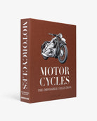 Libro Assouline Motorcycles The Impossible Collection de pie, mostrando cubierta y lomo marrón.