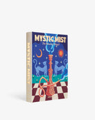 Libro decorativo Mystic Mist de Assouline en posición vertical, mostrando su lomo y portada frontal con ilustración colorida de narguila y leopardos.