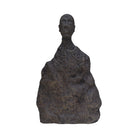 Escultura de figura humana en aluminio color bronce de Vilá Decoración.