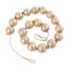 Guirnalda dorada de cuentas de vidrio para decoración - Vilá Decoración - Muebles y decoración en Medellín y Colombia