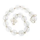 Guirnalda de cuentas de vidrio transparente con cordón beige - Vilá Decoración - Muebles y decoración en Medellín y Colombia