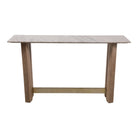 Consola de mármol beige veteado y base de madera con barra de latón, vista frontal.