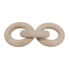 Cadena decorativa de eslabones beige en forma de infinito, objeto de lujo para mesa.