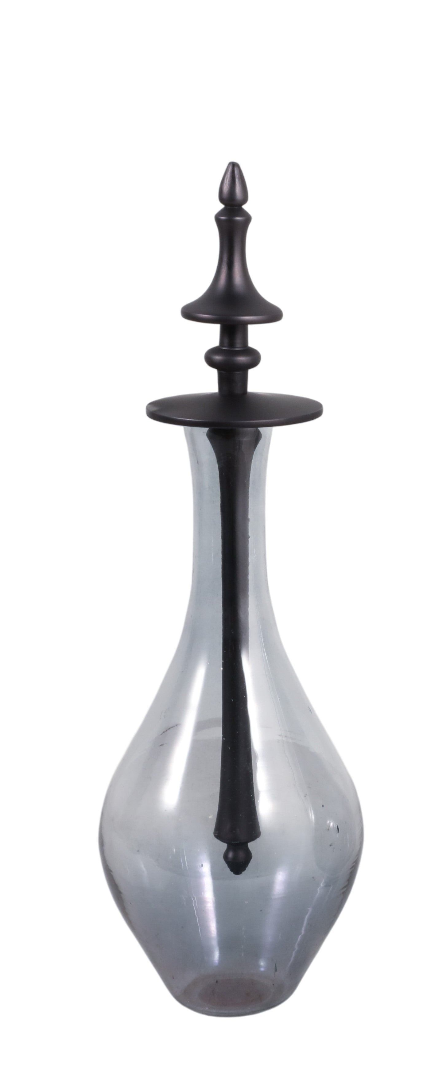 Botella decorativa de vidrio tonalizado con elegante finial oscuro para decoración de interiores.