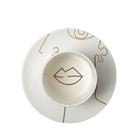 Conjunto taza y plato blanco con detalles dorados - Vilá Decoración - Muebles y decoración en Medellín y Colombia