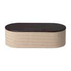 Cofre decorativo alargado de lujo en madera oscura y cuero beige con patrón ondulado, vista frontal