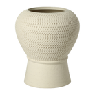 Jarrón decorativo de cerámica color crema con textura en relieve y base cónica, ideal para