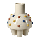 Jarrón decorativo de cerámica crema con detalles de puntos en azul, amarillo y terracota, y patas