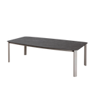 Mesa de comedor Vilá Decoración con tapa de piedra sinterizada gris y estructura de aluminio.