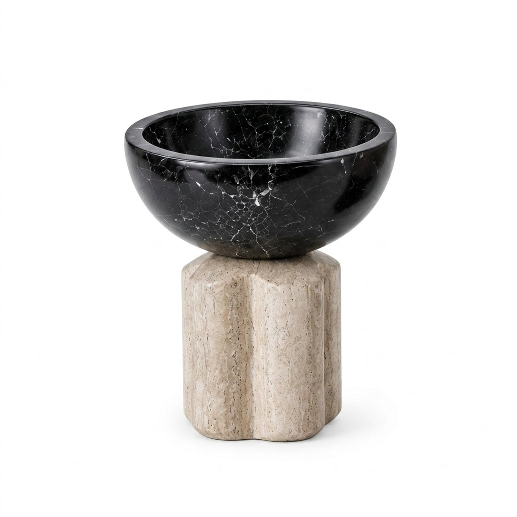 Cuenco decorativo de mármol negro veteado sobre base de travertino beige, diseño exclusivo para el hogar.